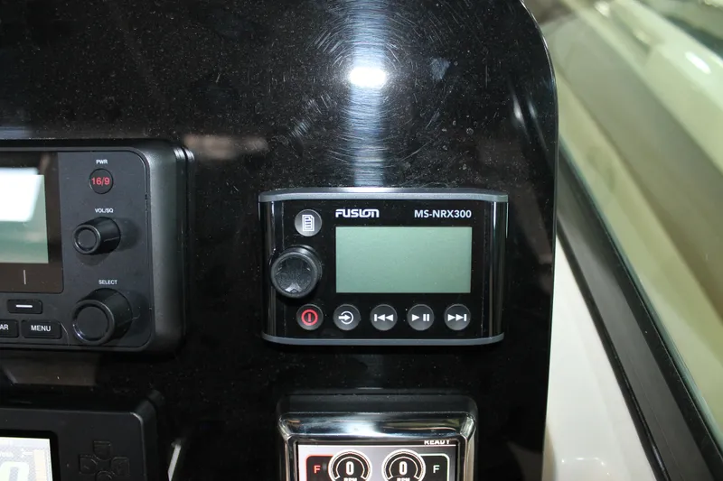 Slide: The Image of Control panel of 2018 Chris-Craft Catalina 26 boat featuring Fusion MS-NRX300. - 20