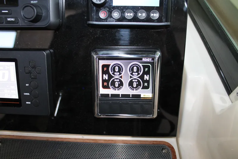 Slide: The Image of Control panel of 2018 Chris-Craft Catalina 26 boat with navigation and system displays. - 21