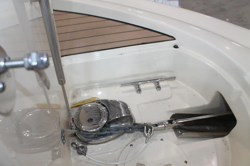 Slide: The Image of 2018 Chris-Craft Catalina 26 anchor system with polished metal and teak accents. - 29
