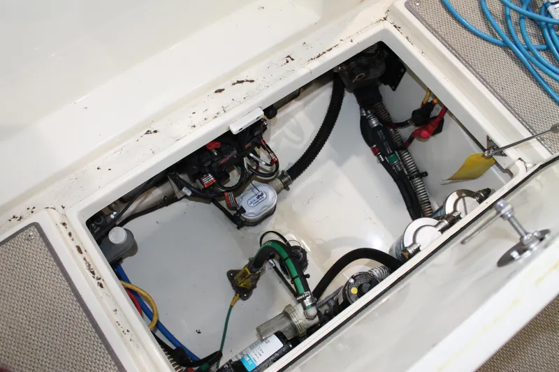 Slide: The Image of Engine compartment of 2018 Chris-Craft Catalina 26, showing mechanical components and wiring. - 6