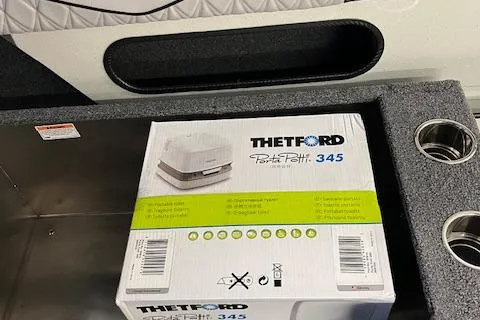 Slide: The Image of Box of Thetford Porta Potti 345 in Duckworth 22 Pacific Pro boat, 2026 model. - 11