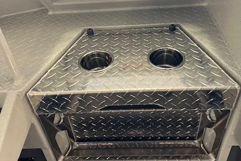 Slide: The Image of Duckworth 22 Pacific Pro 2026 boat with diamond plate flooring and cup holders. - 3