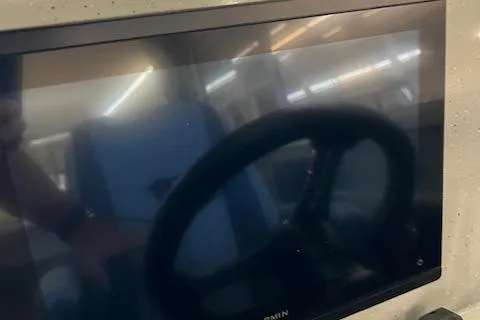 Slide: The Image of Steering wheel and dashboard display of 2026 Duckworth 22 Pacific Pro boat. - 5