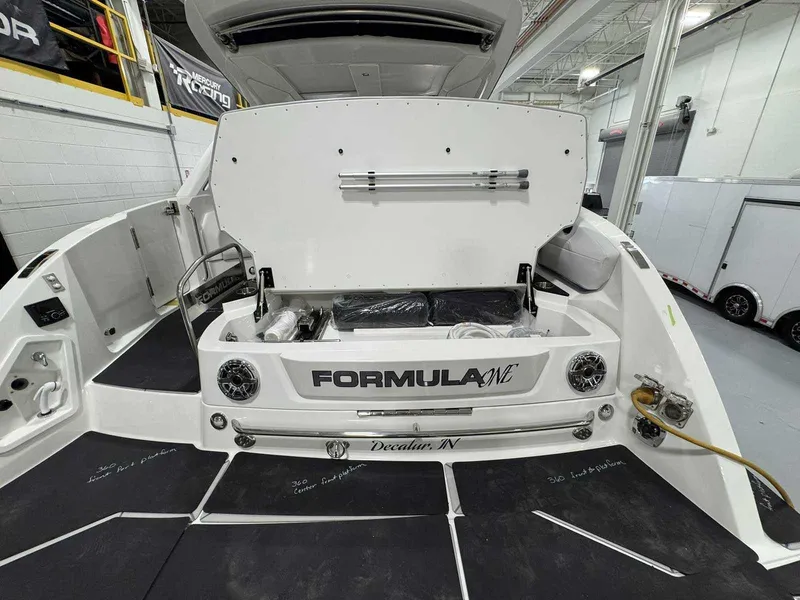 Slide: The Image of 2026 Formula 360 Crossover Bowrider I/O boat interior, showcasing storage and design features. - 11