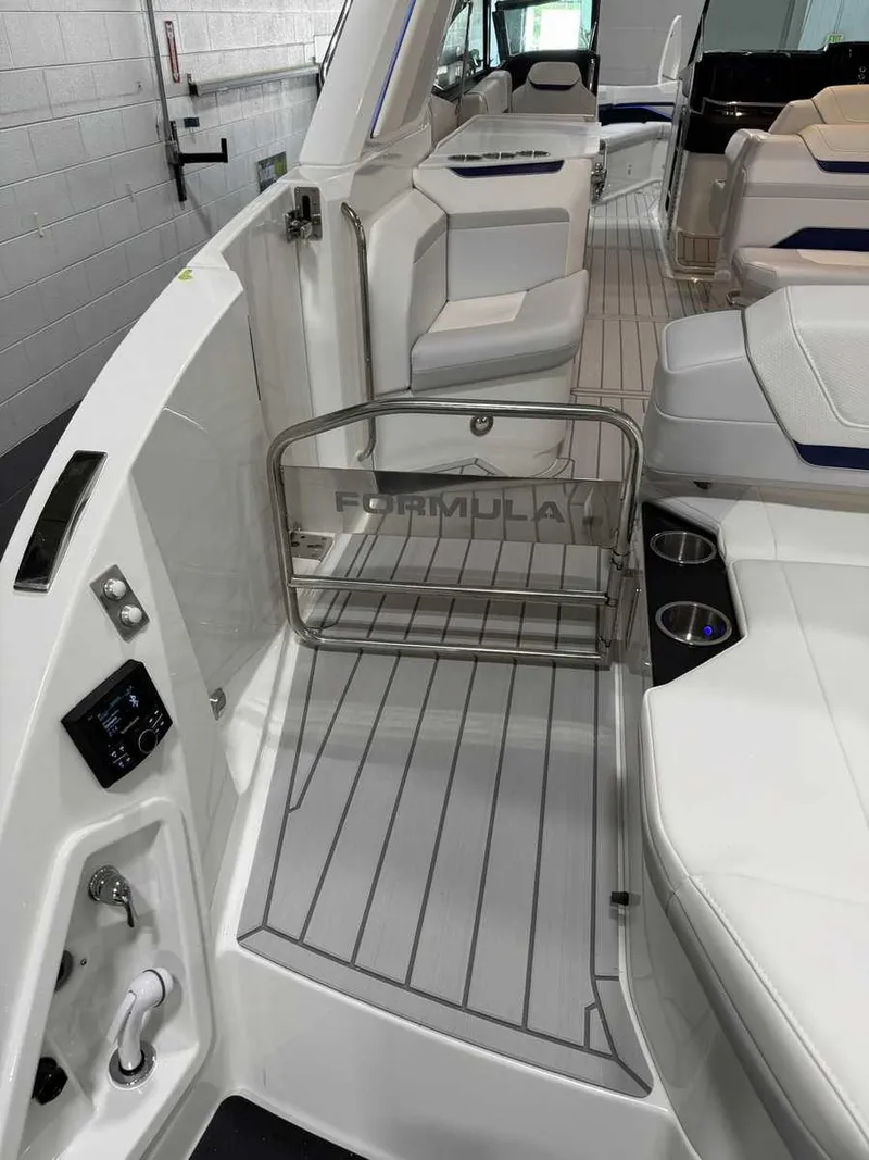 Slide: The Image of 2026 Formula 360 Crossover Bowrider I/O interior with seating and modern design. - 15