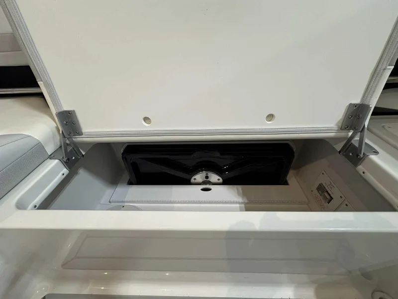 Slide: The Image of Open storage compartment in 2026 Formula 360 Crossover Bowrider I/O boat. - 25