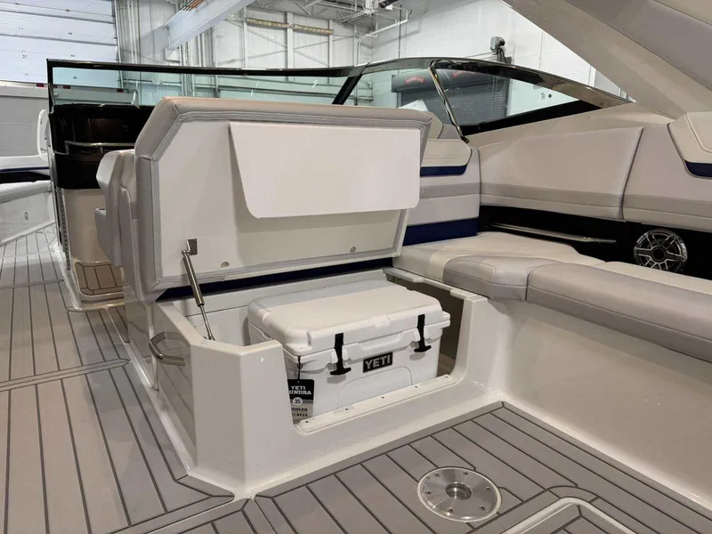 Slide: The Image of 2026 Formula 360 Crossover Bowrider I/O interior with Yeti cooler storage. - 26