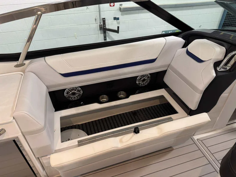 Slide: The Image of 2026 Formula 360 Crossover Bowrider I/O interior with white seating and built-in speakers. - 40