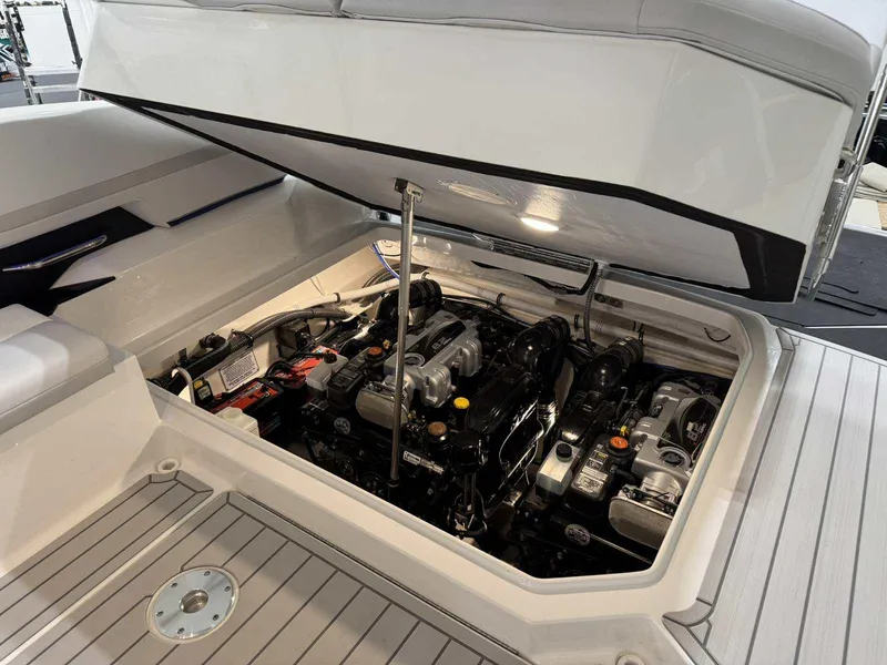 Slide: The Image of 2026 Formula 360 Crossover Bowrider I/O engine compartment with open hatch, showcasing dual engines. - 46