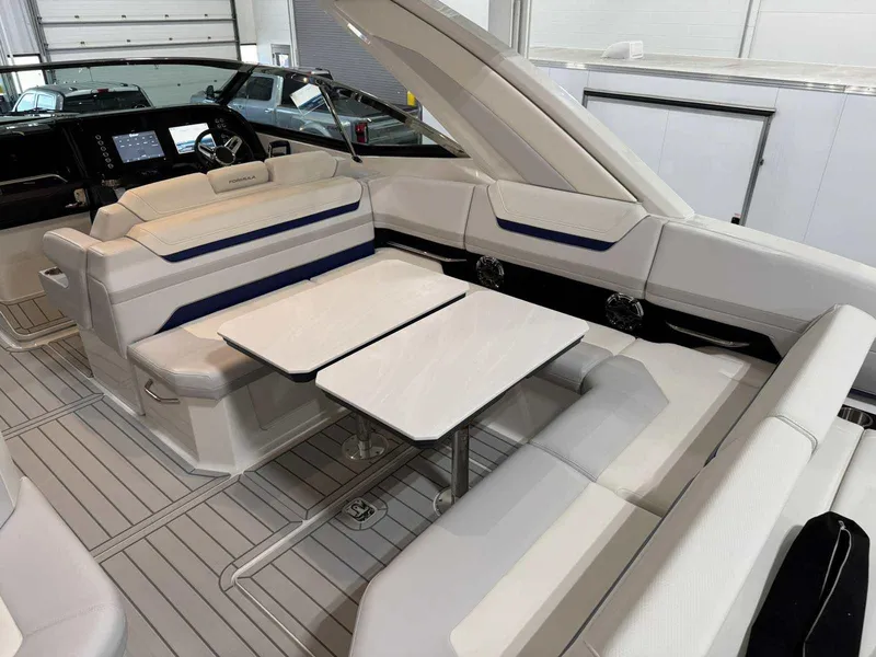 Slide: The Image of 2026 Formula 360 Crossover Bowrider I/O interior with sleek seating and modern dashboard. - 47