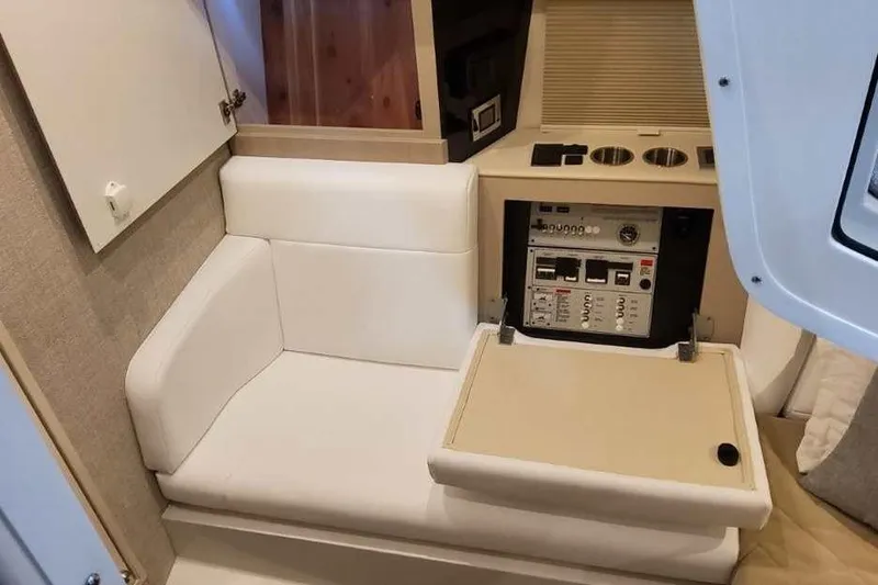 Slide: The Image of Interior of 2027 Formula 360 Crossover Bowrider I/O with white seating and control panel. - 61