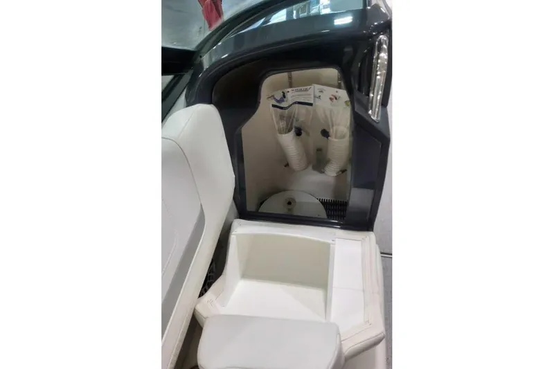 Slide: The Image of Interior view of 2027 Formula 360 Crossover Bowrider I/O boat, showcasing storage compartment. - 32