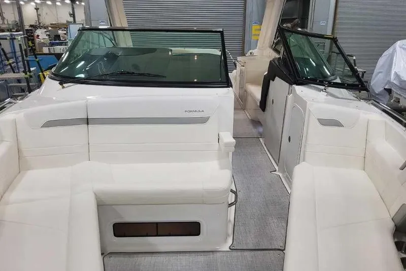 Slide: The Image of 2027 Formula 360 Crossover Bowrider I/O interior with spacious seating and modern design. - 50