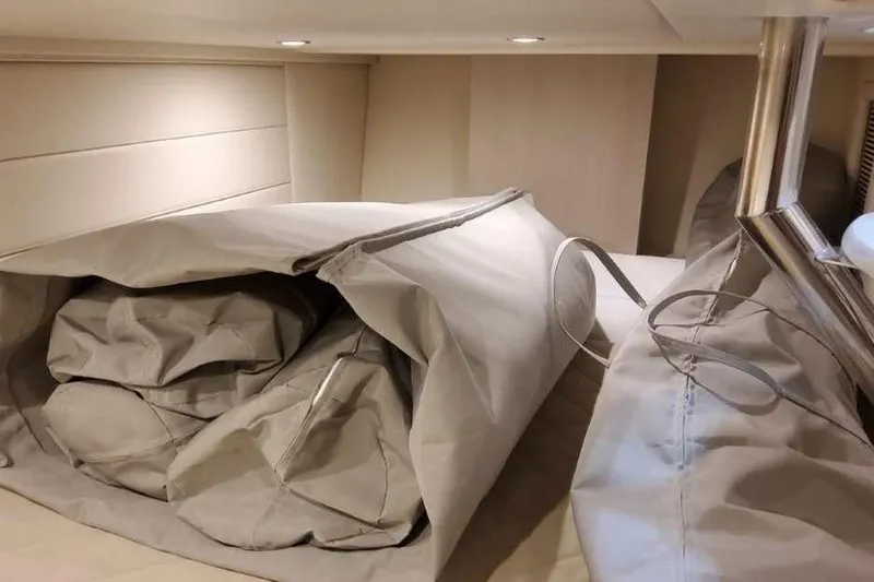 Slide: The Image of Interior cabin of 2027 Formula 360 Crossover Bowrider I/O with stored cushions. - 69
