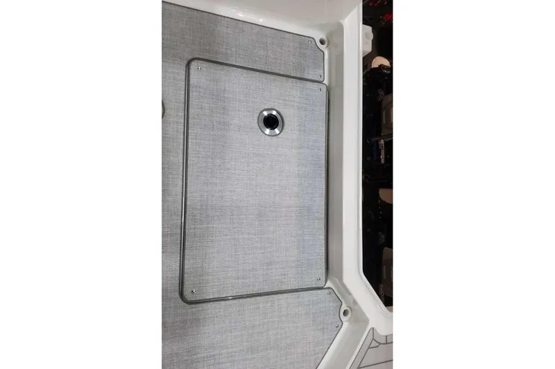 Slide: The Image of 2027 Formula 360 Crossover Bowrider I/O deck hatch with sleek design and metallic finish. - 25