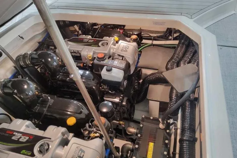 Slide: The Image of Engine compartment of 2027 Formula 360 Crossover Bowrider I/O, showcasing dual engines and components. - 24