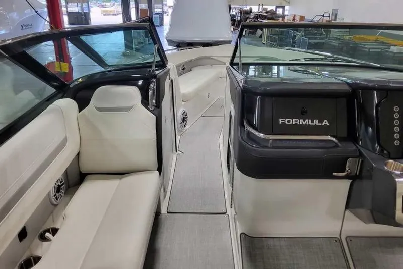 Slide: The Image of 2027 Formula 360 Crossover Bowrider I/O interior with sleek seating and modern dashboard design. - 37
