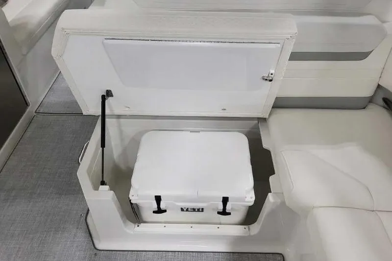 Slide: The Image of Storage compartment with Yeti cooler in 2027 Formula 360 Crossover Bowrider I/O boat. - 27