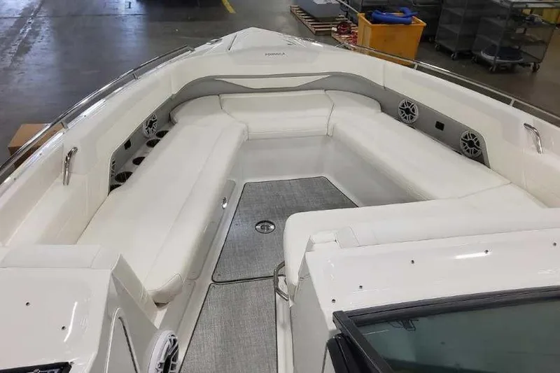 Slide: The Image of 2027 Formula 360 Crossover Bowrider I/O with spacious white seating and modern design. - 40