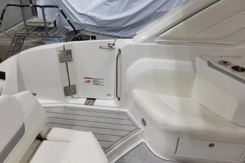 Slide: The Image of Interior view of 2027 Formula 360 Crossover Bowrider I/O, featuring sleek white seating and modern design. - 13