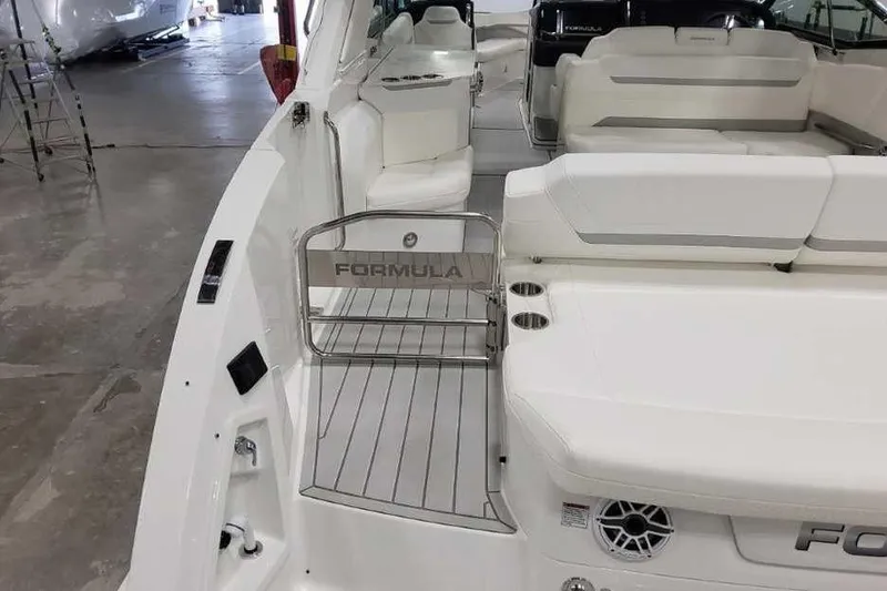Slide: The Image of 2027 Formula 360 Crossover Bowrider I/O interior with sleek seating and modern design. - 17