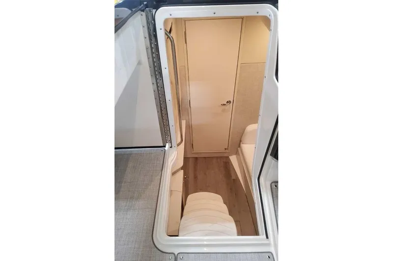 Slide: The Image of Interior view of 2027 Formula 360 Crossover Bowrider I/O, featuring cabin entrance and seating. - 58