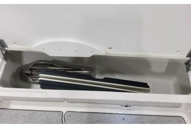 Slide: The Image of Storage compartment of 2027 Formula 360 Crossover Bowrider I/O, featuring organized interior space. - 42