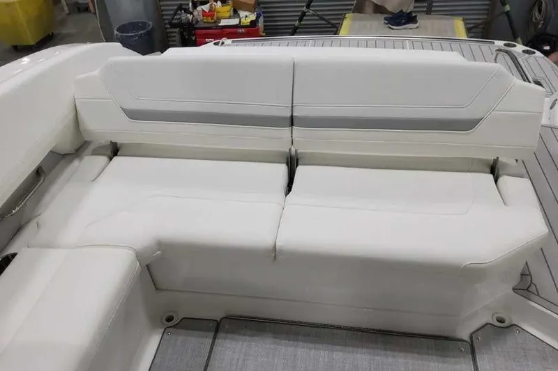 Slide: The Image of 2027 Formula 360 Crossover Bowrider I/O interior seating, featuring sleek white upholstery. - 18