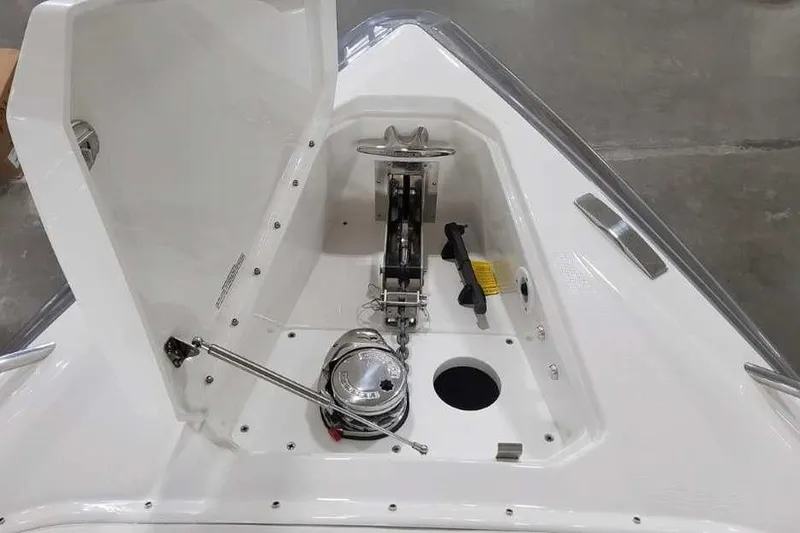 Slide: The Image of Bow anchor compartment of 2027 Formula 360 Crossover Bowrider I/O, featuring modern equipment. - 49