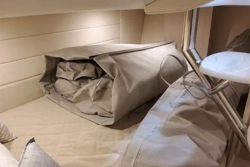 Slide: The Image of Interior cabin of 2027 Formula 360 Crossover Bowrider I/O with folded canvas cover. - 68
