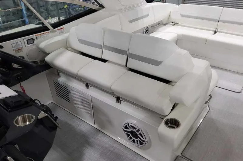 Slide: The Image of 2027 Formula 360 Crossover Bowrider I/O interior with white seating and modern design. - 34