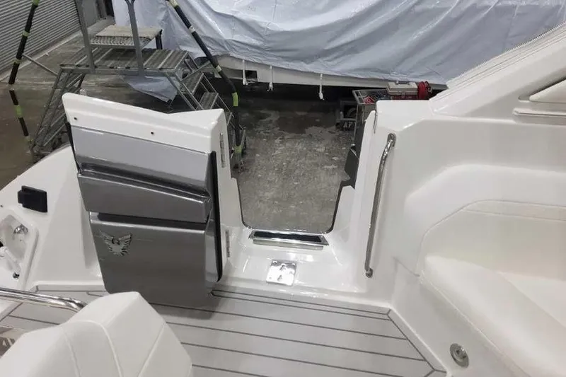 Slide: The Image of Interior view of a 2027 Formula 360 Crossover Bowrider I/O, showcasing sleek design and seating. - 12