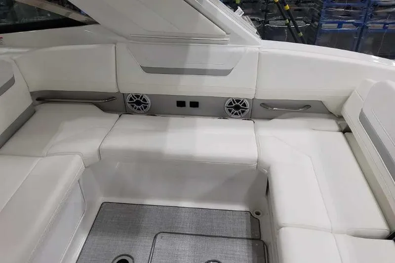 Slide: The Image of 2027 Formula 360 Crossover Bowrider I/O interior with white seating and modern design. - 16