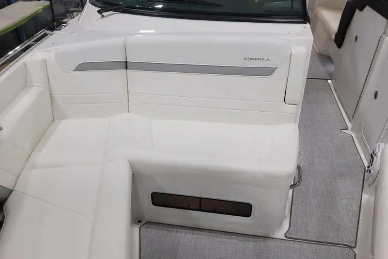 Slide: The Image of 2027 Formula 360 Crossover Bowrider I/O interior with white seating and modern design. - 47