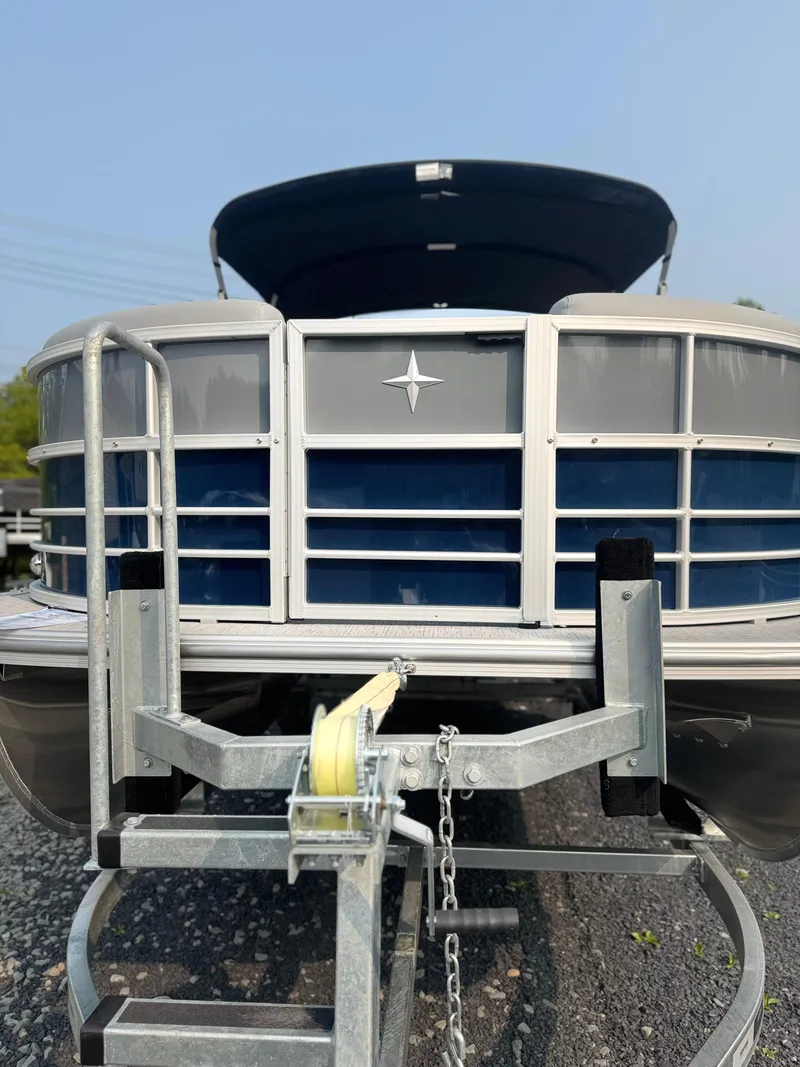 Slide: The Image of 2025 Berkshire 22CL CTS pontoon boat on trailer, front view. - 4