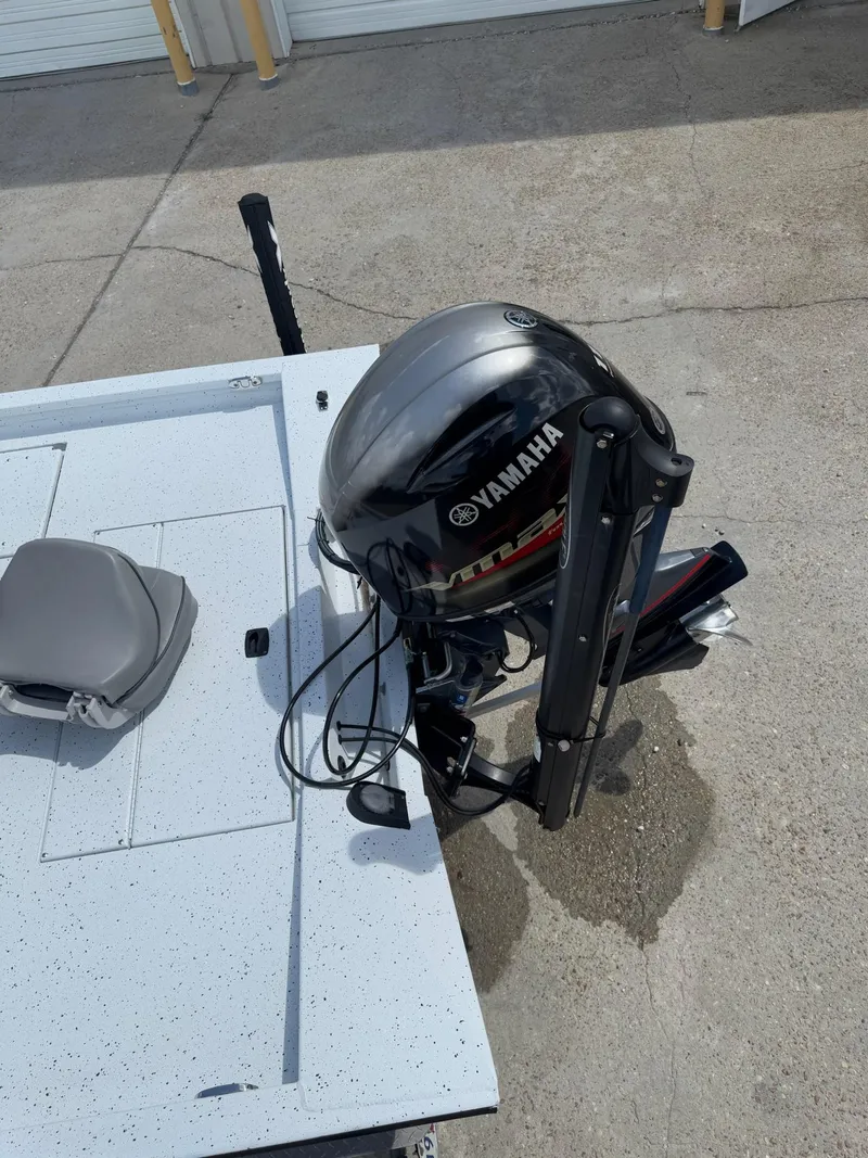 Slide: The Image of 2022 Xpress H20B boat with Yamaha outboard motor, viewed from above. - 11