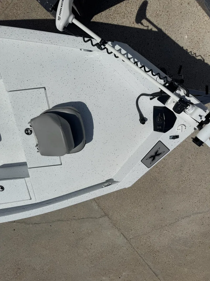 Slide: The Image of 2022 Xpress H20B boat deck with seat and trolling motor, top view. - 16