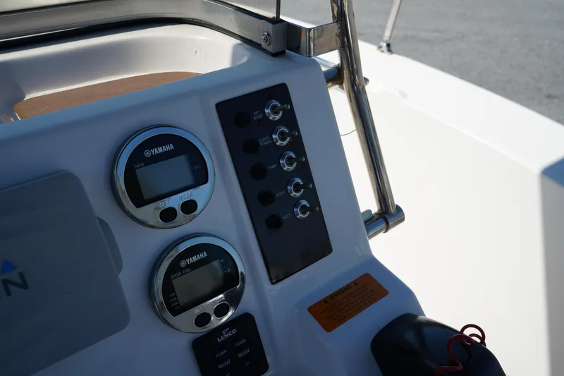 Slide: The Image of Control panel of 2017 Robalo R200ES boat with Yamaha gauges. - 17