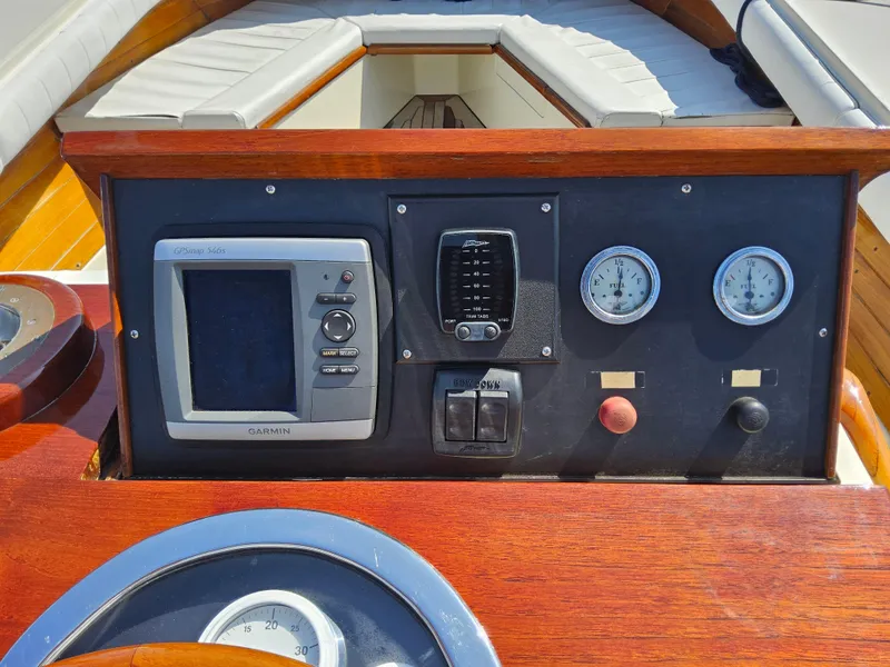 Slide: The Image of Control panel of a 1989 Boca Grande 26 boat with gauges and navigation equipment. - 15