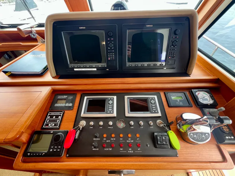Slide: The Image of Control panel of a 2008 Grand Banks 47 Heritage EU yacht with navigation equipment. - 17
