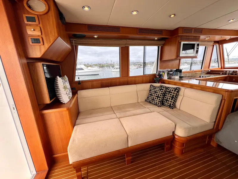 Slide: The Image of Luxurious interior of 2008 Grand Banks 47 Heritage EU yacht with cozy seating area. - 22