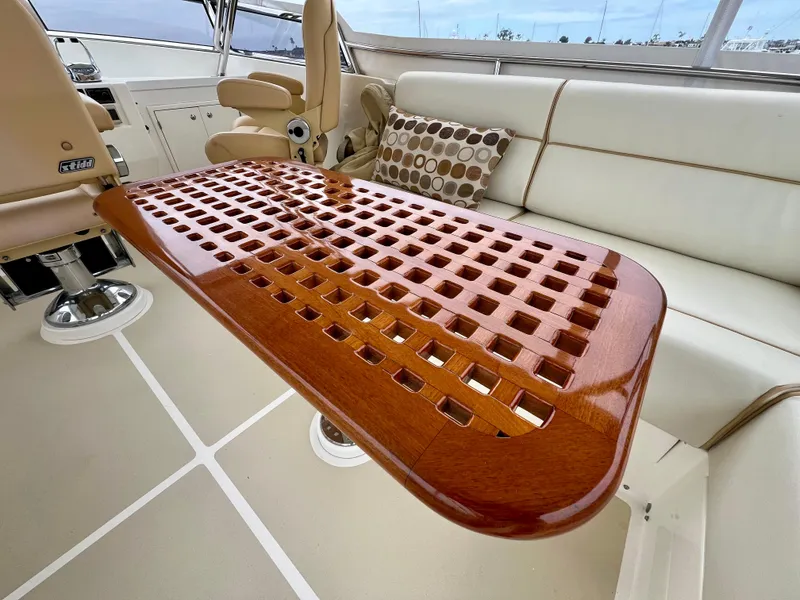 Slide: The Image of Luxurious interior of 2008 Grand Banks 47 Heritage EU yacht with elegant wooden table. - 49