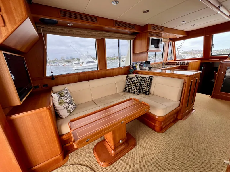 Slide: The Image of Luxurious 2008 Grand Banks 47 Heritage EU yacht interior with elegant wood finish and comfortable seating. - 8