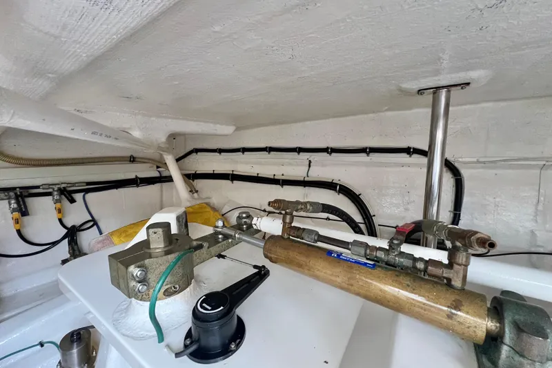 Slide: The Image of Engine room of 2008 Grand Banks 47 Heritage EU with visible piping and valves. - 80