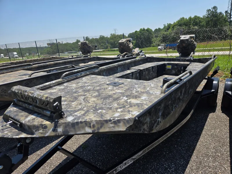 Slide: The Image of 2025 Excel 1754 F4 Shallow Water boat with camouflage design on a trailer. - 15