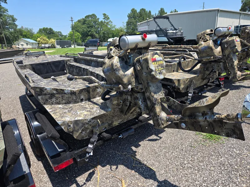 Slide: The Image of 2025 Excel 1754 F4 Shallow Water boat with camouflage design on a trailer. - 18