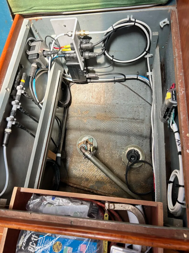 Slide: The Image of Electrical and plumbing systems inside a 1967 LeComte Northeast 38 sailboat. - 10