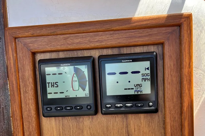 Slide: The Image of Garmin navigation instruments on 1967 LeComte Northeast 38 sailboat dashboard. - 13