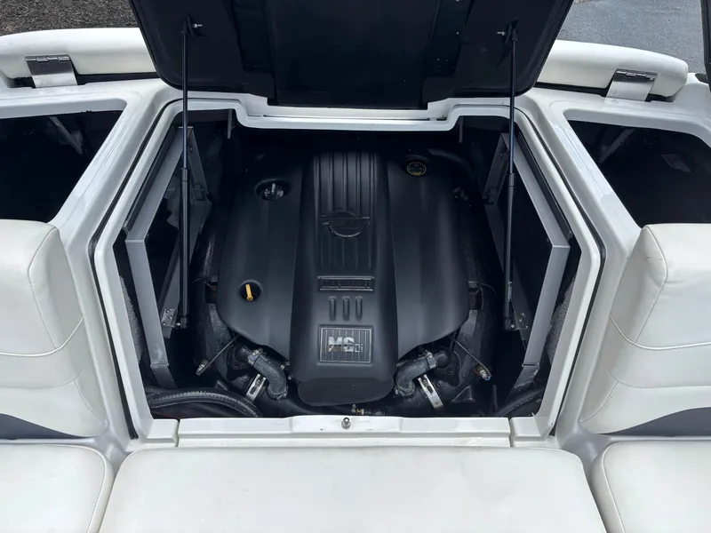Slide: The Image of 2019 Malibu Wakesetter 24 MXZ engine compartment with open hatch. - 12