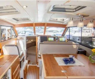 Slide: The Image of 2015 Cutwater 30 Sedan LE interior with modern design and navigation equipment. - 15